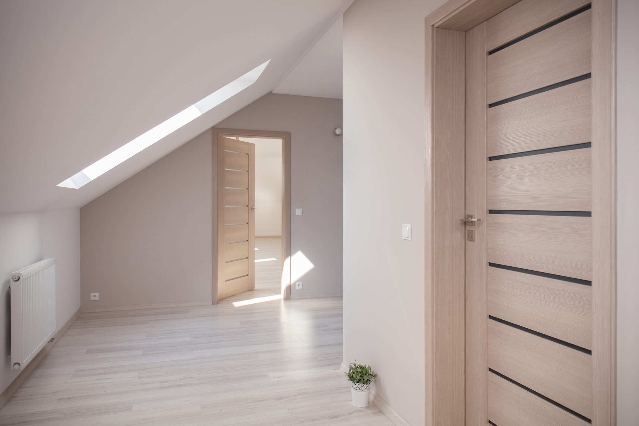 interior of beige room at the attic